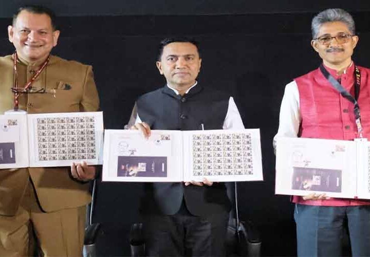Goa Chief Minister Pramod Sawant releasing commemorative stamp honouring cinematographer K Vaikunth at 56th IFFI in Panaji